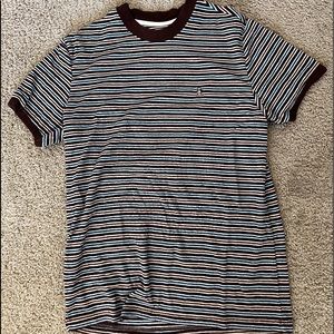 Striped original penguin shirt.